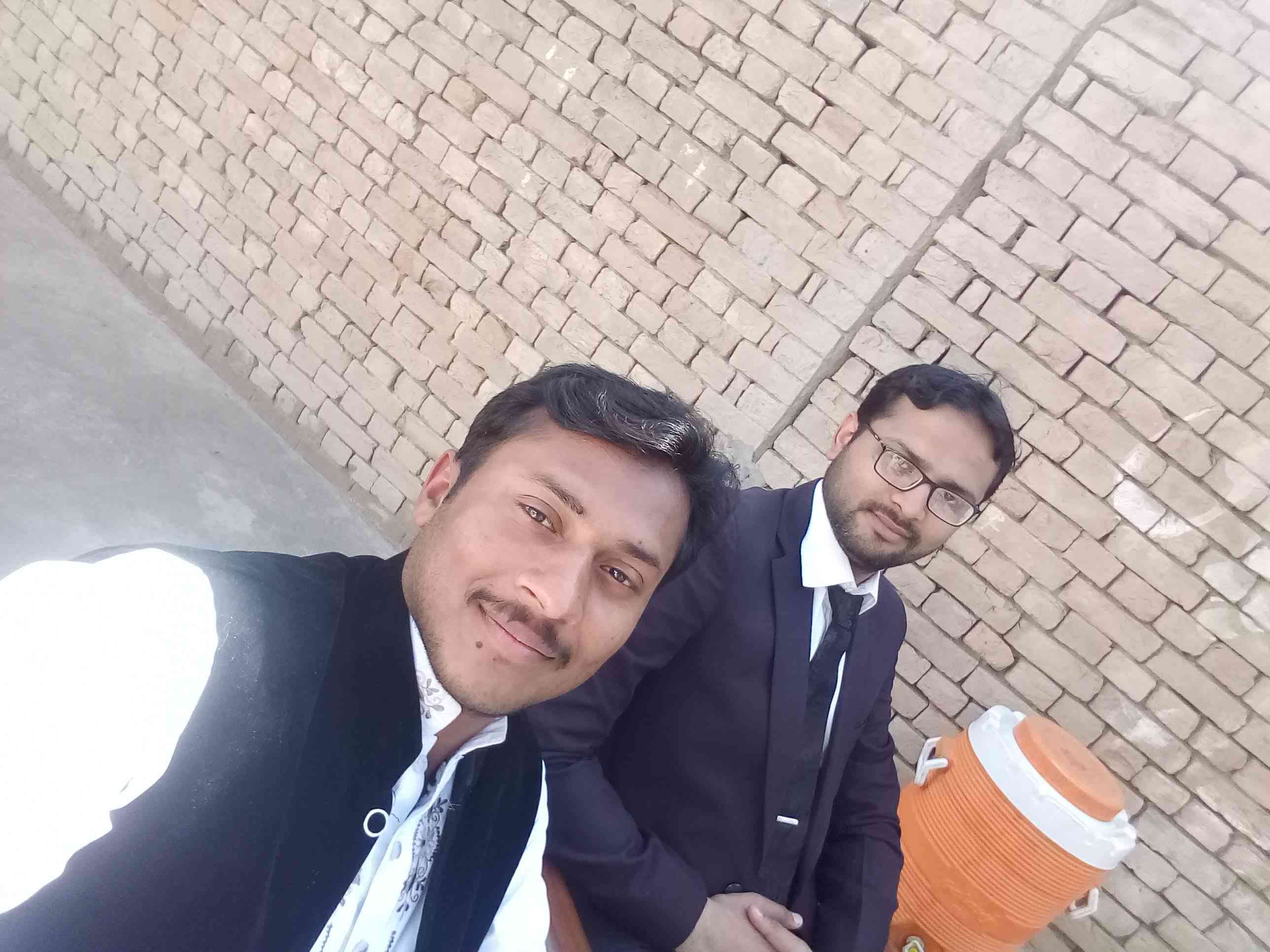 Sanaullah Sajid (Coordinator) with Asif Hassan (Principal)